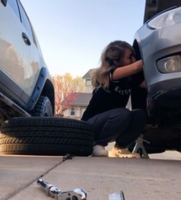 Monique working on her project car